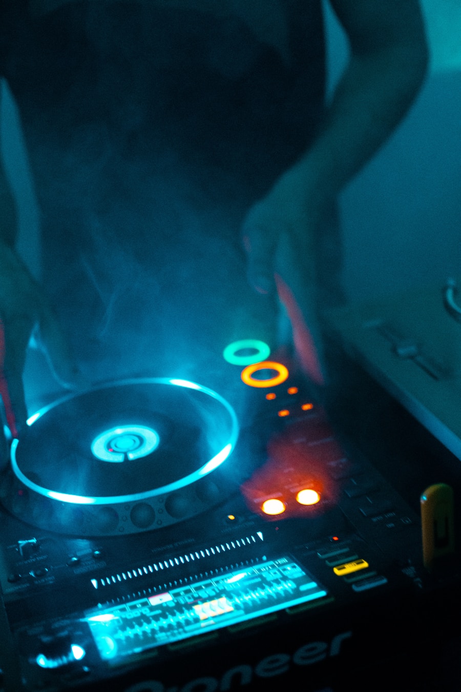 A DJ at the decks — atmospheric, smoky, in control